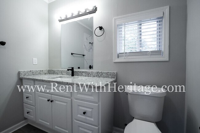 Building Photo - GORGEOUS BRICK RANCH WITH ALL THE UPGRADES...