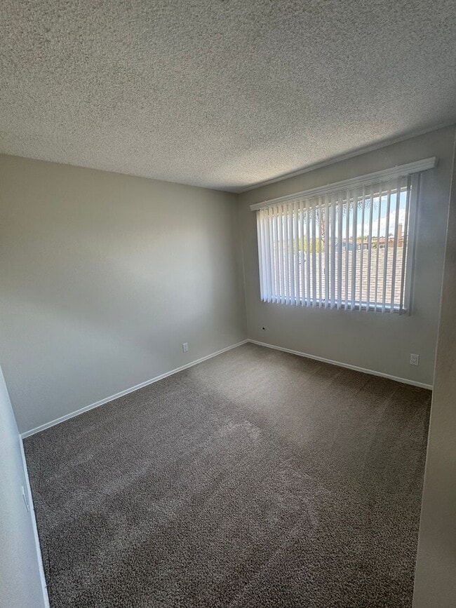 Building Photo - COMING SOON! 3 Bed + 1.5 Bath Townhouse