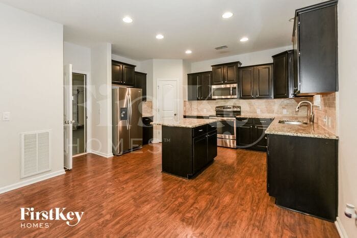 Building Photo - 6714 Barefoot Forest Dr