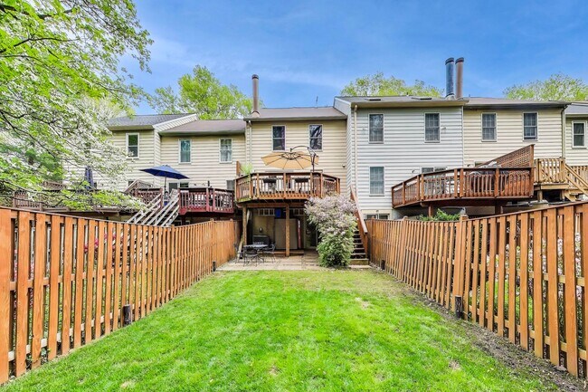 Building Photo - COMINGS SOON - Beautifully Updated Winchester-Built Townhome Backing to Serene Parkland.