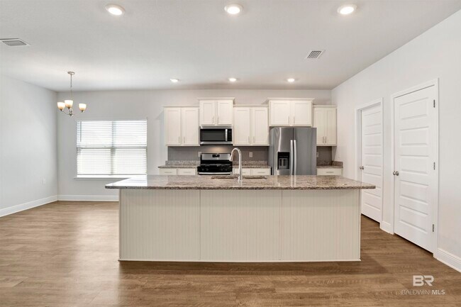 Building Photo - 24847 Smarty Jones Cir