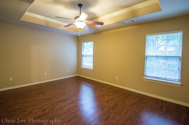 Building Photo - Three bedroom Home with Hardwood Floors Th...