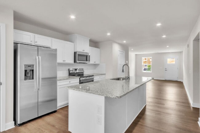 Building Photo - Modern New, Never Lived-in 3BR/2.5BA Townh...