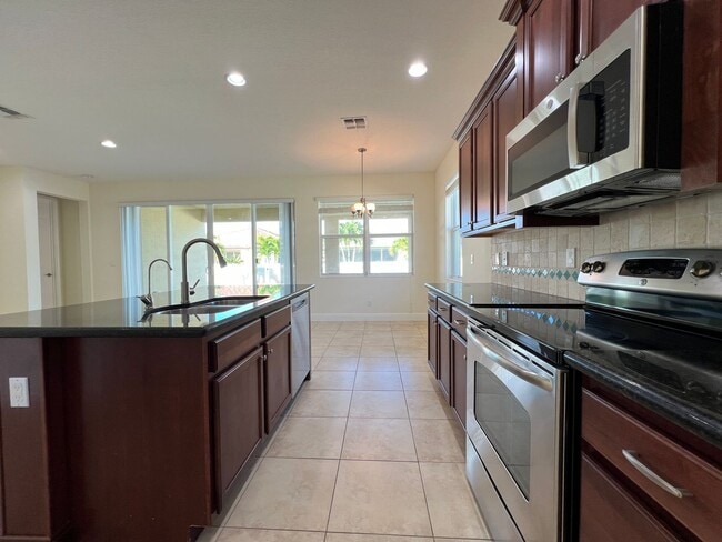 Building Photo - Luxury Living in a Gated Community – Modern 2-Bed Home with Premium Amenities!