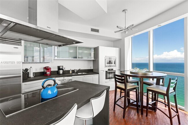 Building Photo - 18201 Collins Ave
