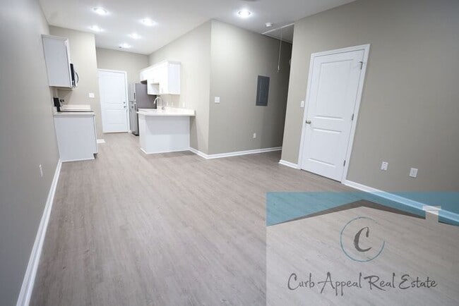 Building Photo - Luxury 2 bed 1 bath apartment - brand new construction!! Washer, dryer and utilities included!!