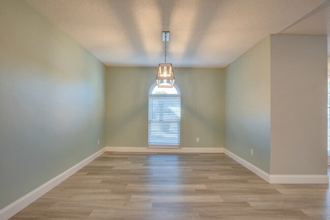 Building Photo - Lakefront 3BR/2BA Home on Orion Lake with Florida Room, Screened Patio, Hot Tub (As-Is), Solar Pa...