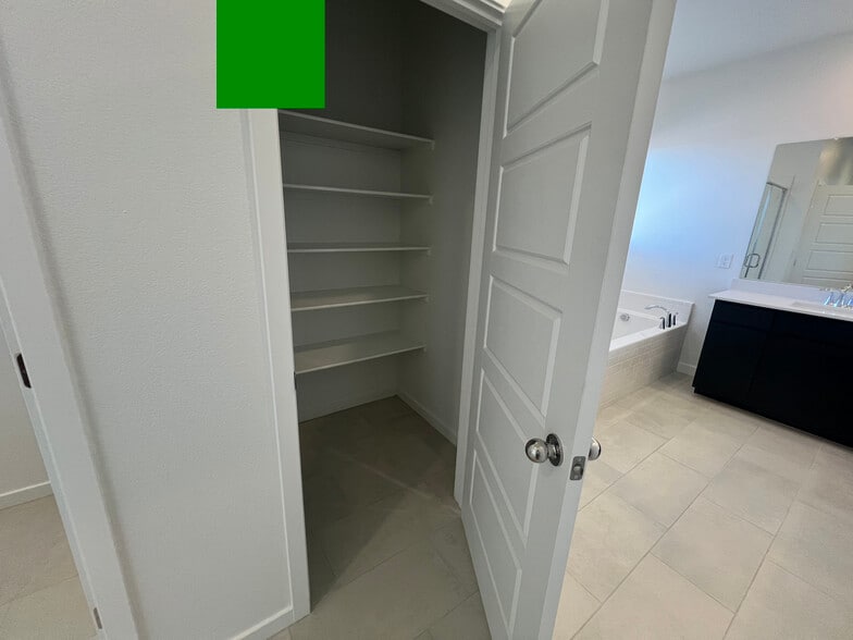 Primary linen closet - 486 Daphne Terrace St