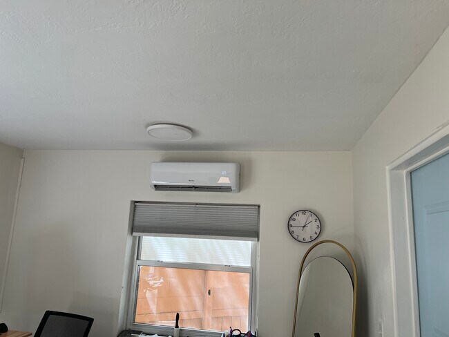 mini-split in living room - 1301 NE 6th St