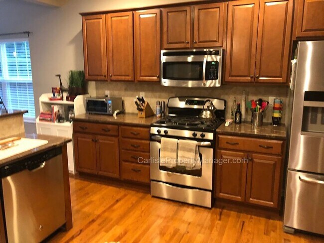 Building Photo - Modern Carlisle Rental with heated inground pool, fireplace, open floor plan, and finished basement