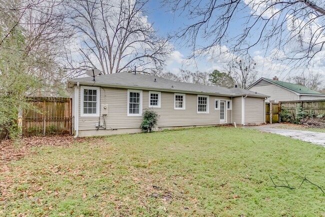Building Photo - Three bedroom two bath