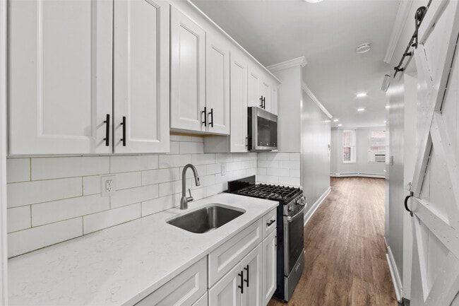 Building Photo - 3027-35 John F. Kennedy Blvd