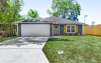 Building Photo - A beautiful 4 bedroom, 2 bathroom property...