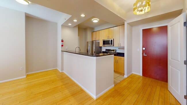 Building Photo - Spacious One Bedroom Plus Den W/MASSIVE Private Balcony Available Now!