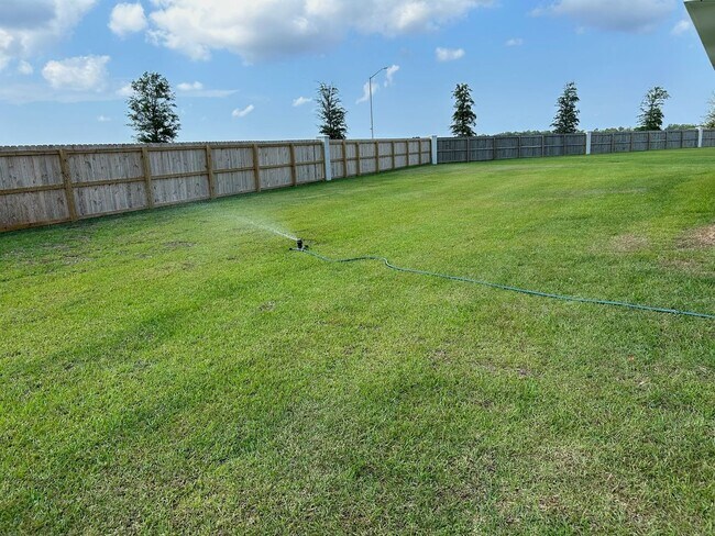 Building Photo - 4BR/2BA Gulf Shores home with community pool