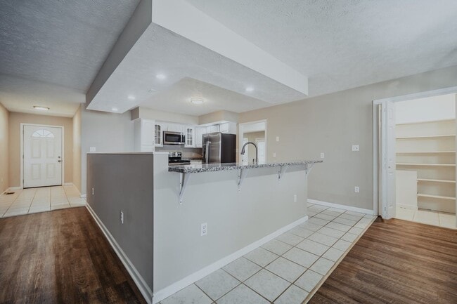 Building Photo - SHORT TERM - Spacious 3-Bedroom home with Wrap-Around Porch