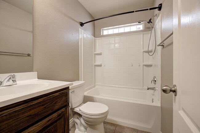 Building Photo - Spacious 4-Bedroom Home with Modern Upgrad...