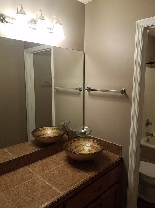 Building Photo - Spacious 3BR Brick Home with Open Split Floor Plan & Tiled Back Porch on Nearly an Acre