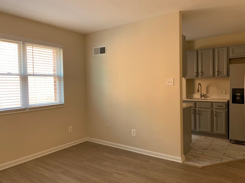 Picture showing new floors in the evening. - 526 Kenyon Street NW #101