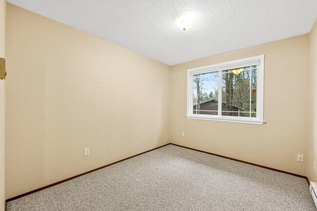Building Photo - Charming Tacoma Home with A/C, RV Parking, Workshop & Skylit Living Room