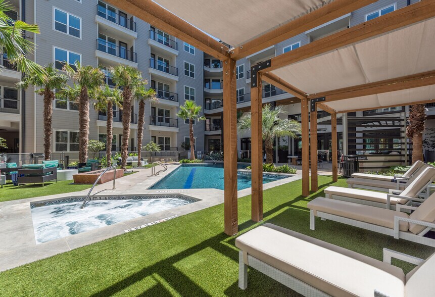 Sparkling Pool with Outdoor Covered Lounge Areas - Overture Domain 55+ Active Adult Apartment Homes