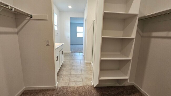 Building Photo - Military Jets Fly Over this 4BR House in Litchfield Park