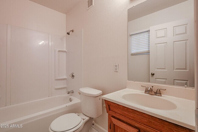 Building Photo - 3408 W Port Au Prince Ln