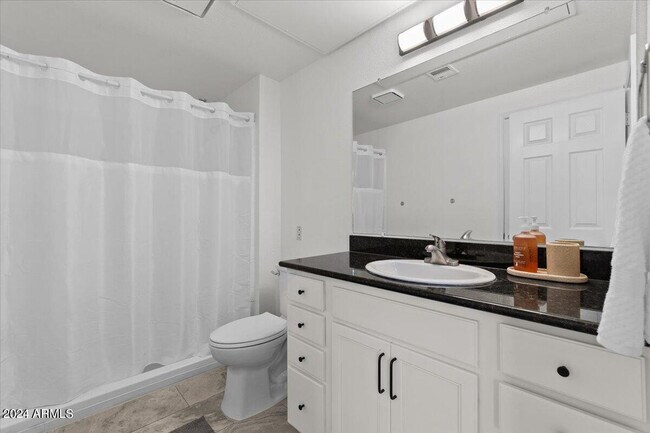 Building Photo - 7009 E Acoma Dr