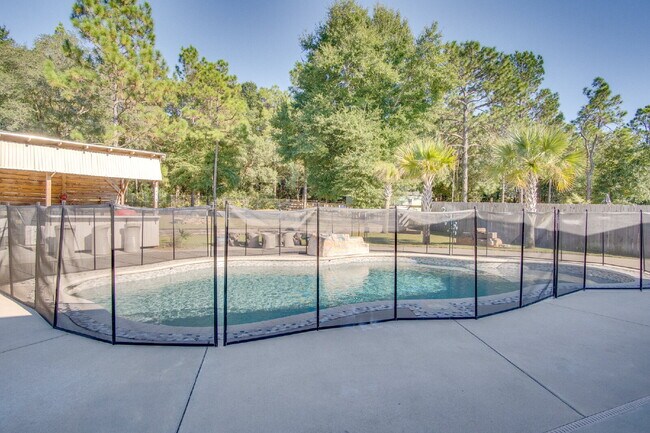 Building Photo - Backyard Bliss: Pool, Cabana & Fire Pit in...