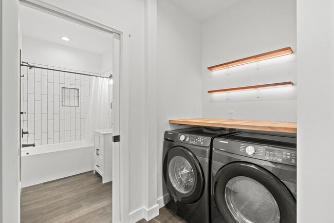 Building Photo - Brand new 2 bed/2 bath, central a/c, dishwasher, washer & dryer, deck & patio! March rent free!