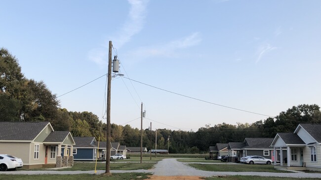 End of street looking back to highway - 81 Villa Lane