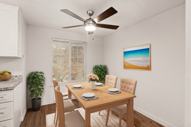 Experience dining in style with this chic and inviting dining area. - Monte Vista Apartments