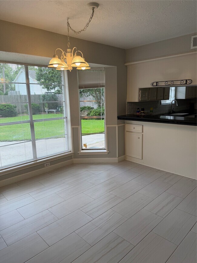 Building Photo - 8006 Pine Cup Dr
