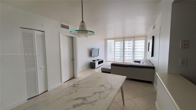 Building Photo - 5600 Collins Ave
