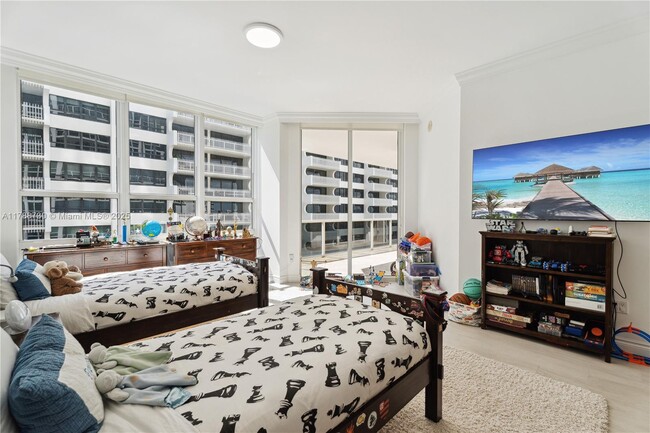 Building Photo - 10225 Collins Ave