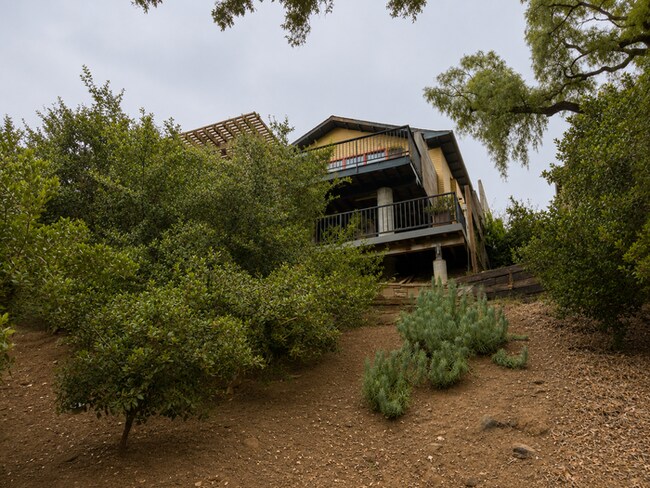 Building Photo - Luxury Hillside Retreat with Expansive Decks, Designer Finishes & Canyon Views