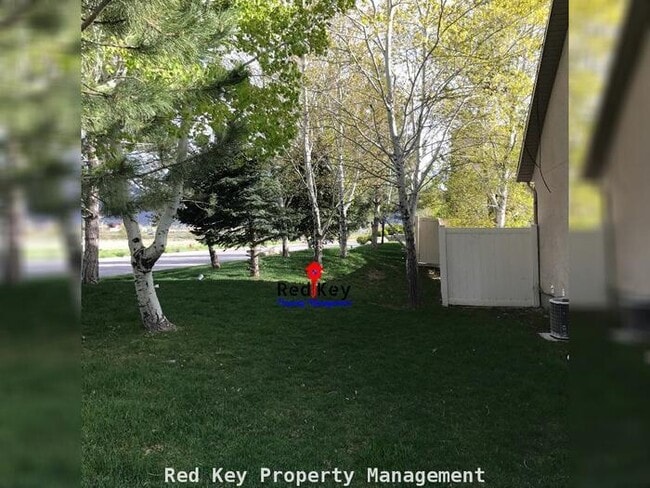 Building Photo - The Maples Condo #119