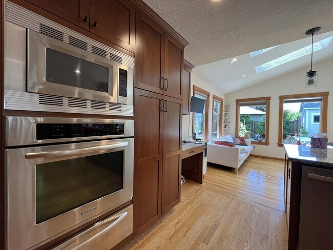 Building Photo - Bright and Open 4 Bedroom Cedar Mill Home with Vaulted Ceilings, Skylights & Multiple Living Areas