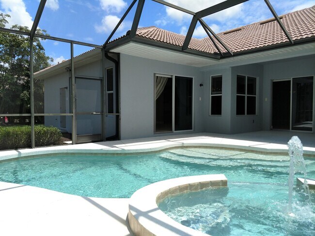 Building Photo - Annual Rental: Luxurious 4 Bedroom 3 bath POOL home in Woodlands of Rivendell! Just Blocks form P...