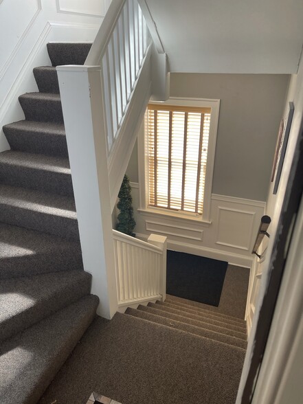 Elegant staircase to apartment - 1748 E 84th Pl