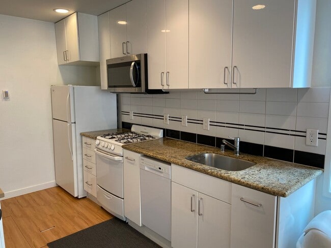 Building Photo - North Capitol Hill Garden Unit- 2 bedroom ...
