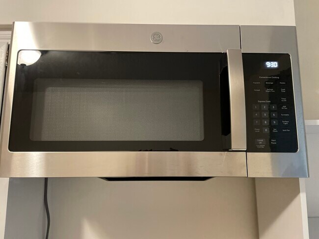 New microwave with cooking fan, lighting for range - 5523 Ellsworth Ave