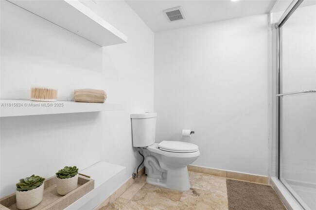 Building Photo - 2401 Collins Ave