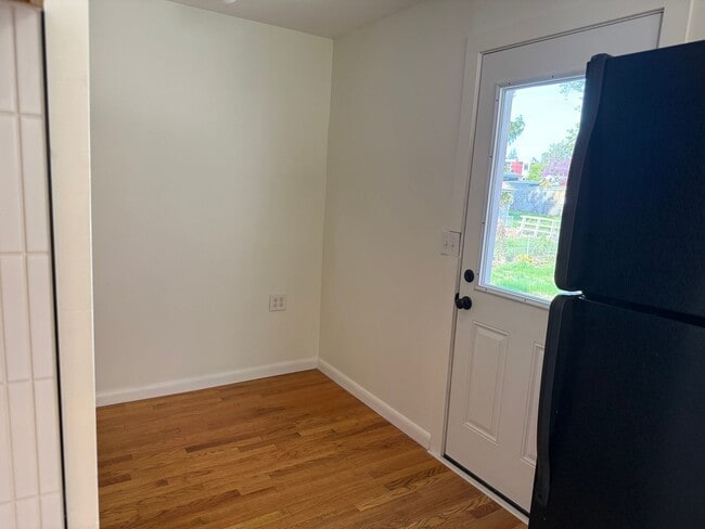 Building Photo - Newly Renovated 3-Bedroom, 1-Bathroom End-Row Townhome with Bonus Room & Backyard!