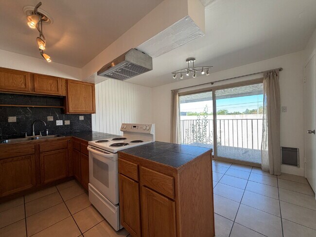 Building Photo - Spacious 2-Bedroom Condo with Fireplace, Private Patio & In-Unit Laundry in DTC!