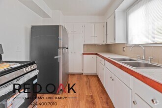 Building Photo - ~2 Months FREE~ Welcoming One Bedroom with...