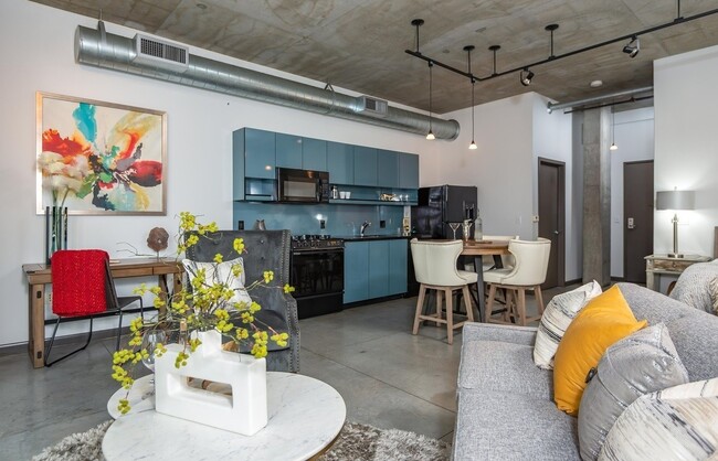 Building Photo - Rare Availability in the Streetcar Lofts, Parking, and Some Utilities Included