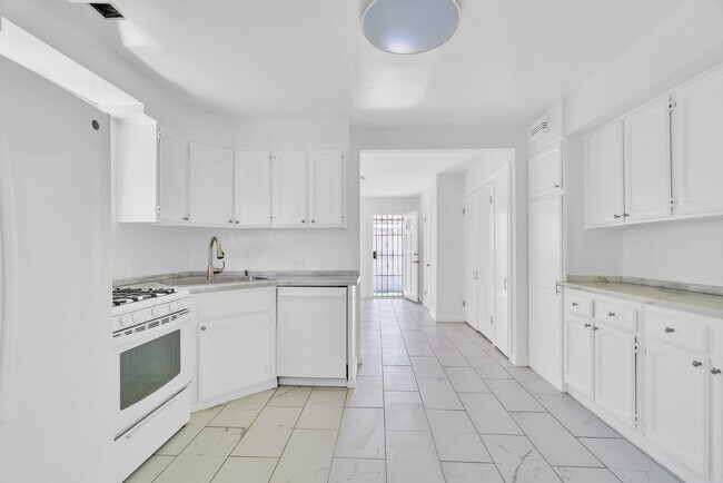 well appointed kitchen with storage cabinets - 2935 Westwood Blvd