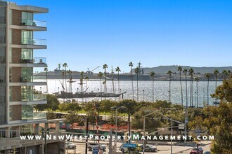 Building Photo - Views, Views, Views! Stunning Top-Floor Little Italy 2-bedroom Loft at The Waterfront!