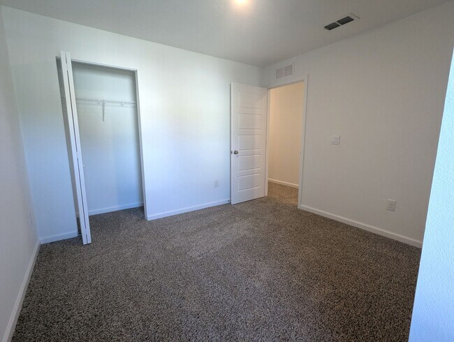 Building Photo - BRAND NEW 3 Bedroom, 2.5 Bath - End Unit - Townhome with Upgrades - located on the Westside - CLO...